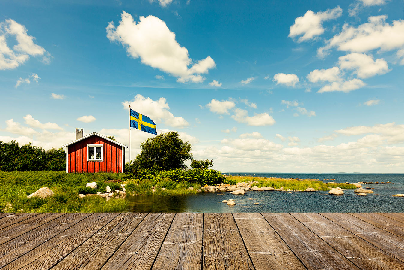 Swedish summer lake and flag