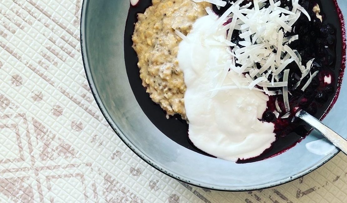 Serving Suggestion of Banana Cinnamon Oats with Wild Blueberry Sauce